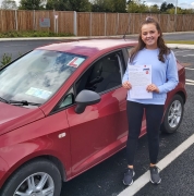 Kate McGloin posing with PASS certificate