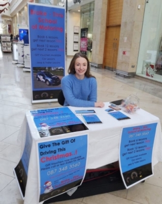 Rachael sitting at promotion in the Marshes, 2019